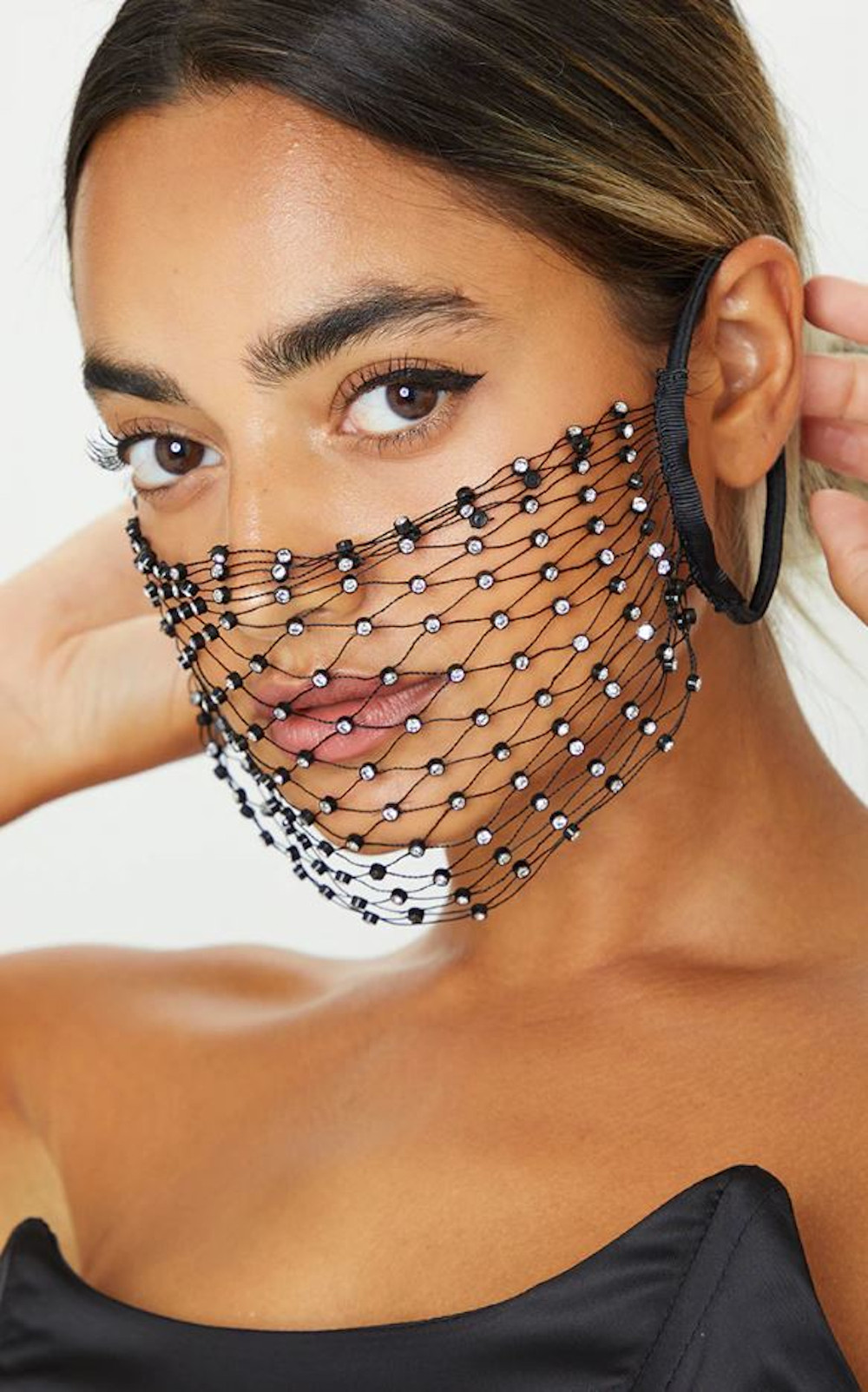 Using a face mask to block coronaviruses has been compared to using a chain link fence to stop mosquitos.